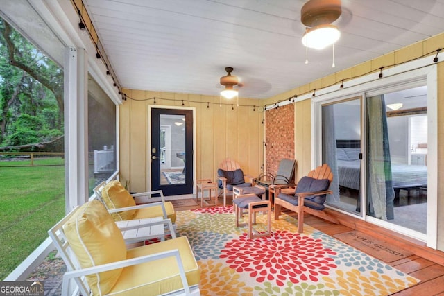 109 Mackqueen Dr, Brunswick, GA 31525 - sunroom / solarium featuring ceiling fan and outdoor lounge area