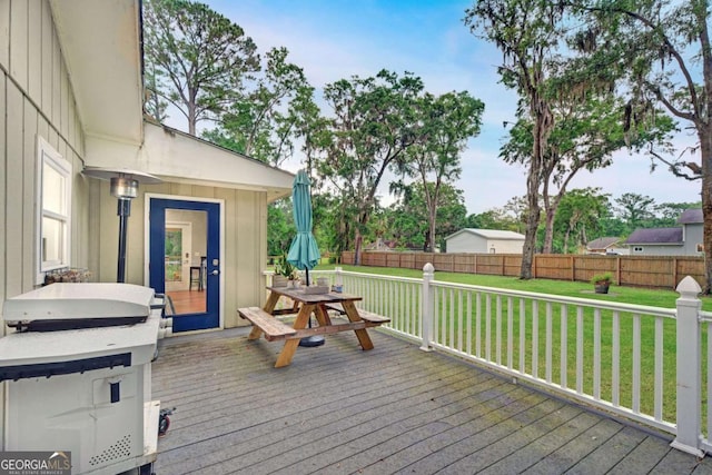 109 Mackqueen Dr, Brunswick, GA 31525 - wooden terrace featuring outdoor dining area