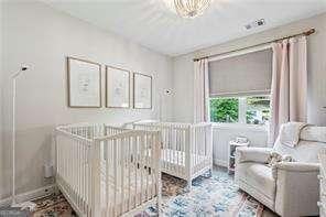 3617 Carson Ln SE, Smyrna, GA 30080 - bedroom featuring a nursery area