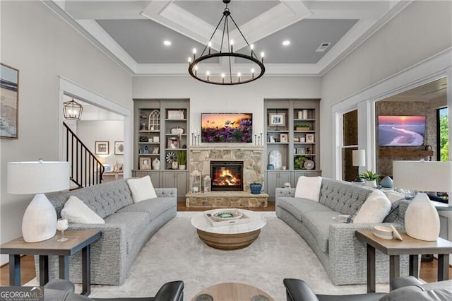 5844 Yoshino Cherry Ln, Braselton, GA 30517 - living area featuring a chandelier, coffered ceiling, a stone fireplace, crown molding, and stairway
