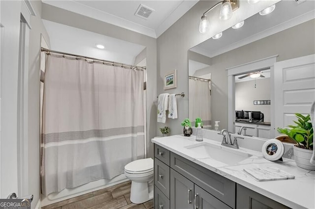 5844 Yoshino Cherry Ln, Braselton, GA 30517 - full bathroom featuring wood finished floors, vanity, toilet, ceiling fan, and shower / bathtub combination with curtain