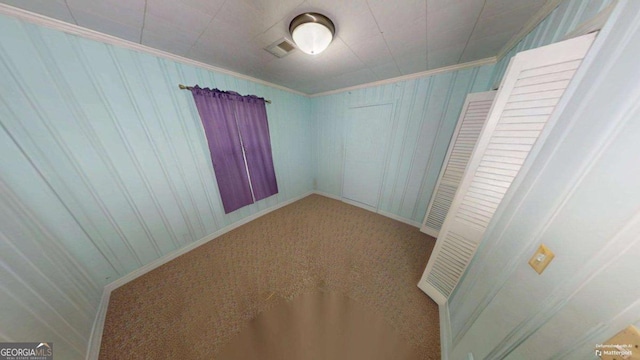2422 Williams Mill Rd, Zebulon, GA 30295 - unfurnished bedroom featuring crown molding and carpet