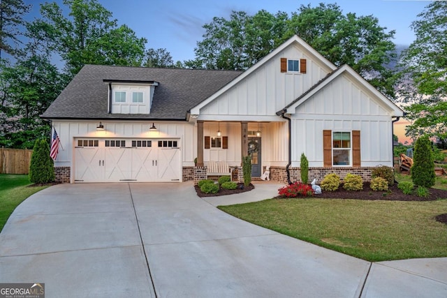 141 Alaina Rd, Canton, GA 30115 - modern inspired farmhouse with board and batten siding, roof with shingles, concrete driveway, and covered porch
