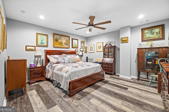 2109 Brewers Mill Rd, Elberton, GA 30635 - bedroom featuring wood finished floors, recessed lighting, baseboards, and ceiling fan