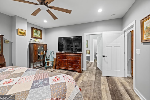 2109 Brewers Mill Rd, Elberton, GA 30635 - bedroom with wood finished floors, recessed lighting, baseboards, and a ceiling fan
