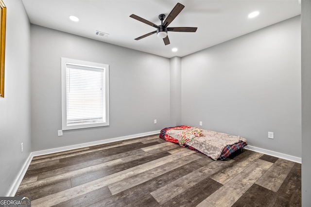 2109 Brewers Mill Rd, Elberton, GA 30635 - bedroom with wood finished floors, recessed lighting, and baseboards