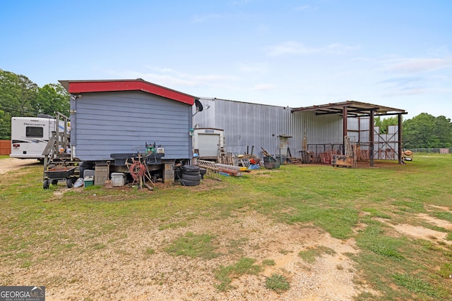 2109 Brewers Mill Rd, Elberton, GA 30635 - rear view of house with a yard