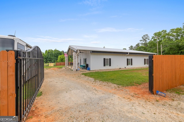 2109 Brewers Mill Rd, Elberton, GA 30635 - rear view of property featuring a gate and metal roof