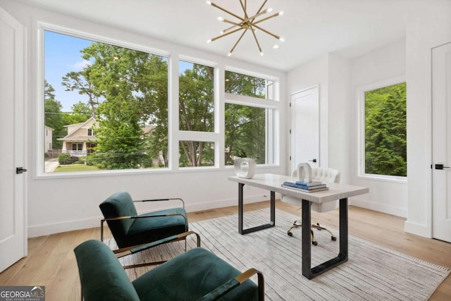 1287 Star Dr NE, Brookhaven, GA 30319 - office with healthy amount of natural light, a chandelier, baseboards, and light wood-type flooring