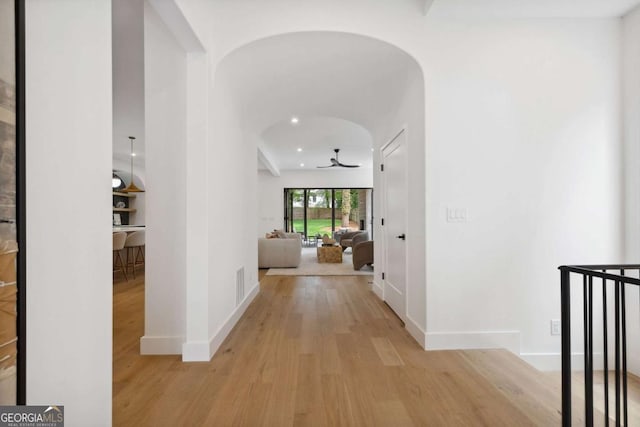 1287 Star Dr NE, Brookhaven, GA 30319 - corridor with arched walkways, wood finished floors, baseboards, and recessed lighting