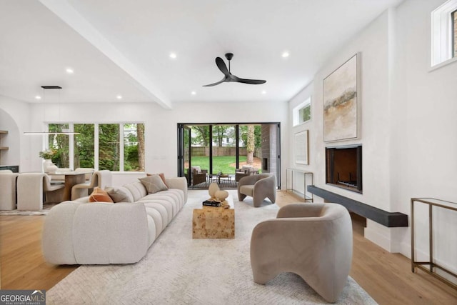 1287 Star Dr NE, Brookhaven, GA 30319 - living area featuring a fireplace, recessed lighting, light wood-style flooring, and a ceiling fan