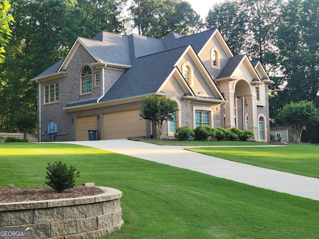 45 Mountain Crest Dr, Oxford, GA 30054 - view of front facade featuring a front yard, driveway, a shingled roof, and brick siding