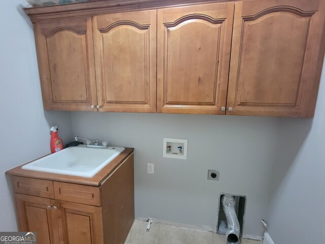 45 Mountain Crest Dr, Oxford, GA 30054 - laundry room with cabinet space, hookup for a gas dryer, hookup for an electric dryer, and hookup for a washing machine