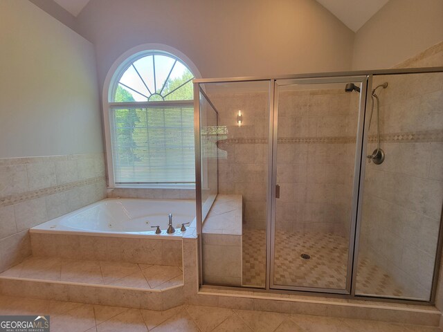 45 Mountain Crest Dr, Oxford, GA 30054 - bathroom with a shower stall, tile patterned floors, and lofted ceiling