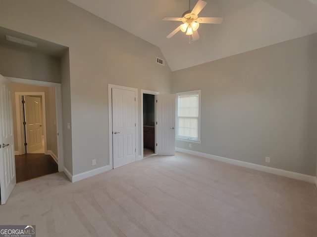 45 Mountain Crest Dr, Oxford, GA 30054 - unfurnished bedroom with light colored carpet, baseboards, high vaulted ceiling, and ceiling fan