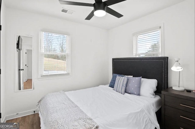 251 Aurora Ave NW, Atlanta, GA 30314 - bedroom featuring wood finished floors, baseboards, and ceiling fan