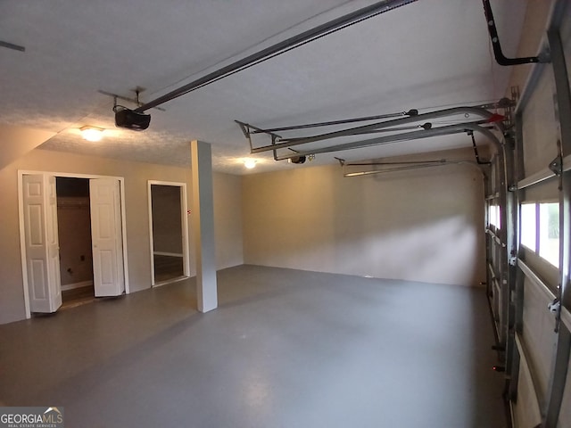 5517 Rock Shoals Way, Atlanta, GA 30349 - garage with a garage door opener