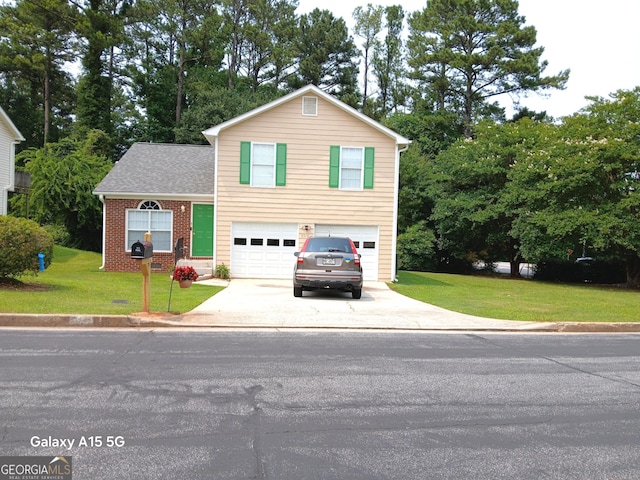 5517 Rock Shoals Way, Atlanta, GA 30349 - view of front of property with concrete driveway, a garage, a front lawn, and brick siding