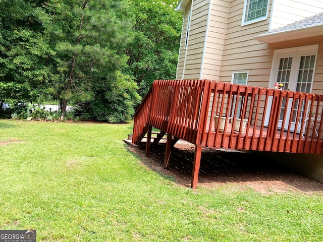 5517 Rock Shoals Way, Atlanta, GA 30349 - view of grassy yard with a deck