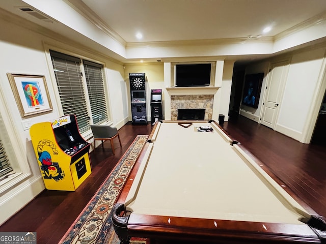 1023 Little Darby Ln, Suwanee, GA 30024 - recreation room featuring a raised ceiling, dark wood-style floors, ornamental molding, billiards table, and a fireplace