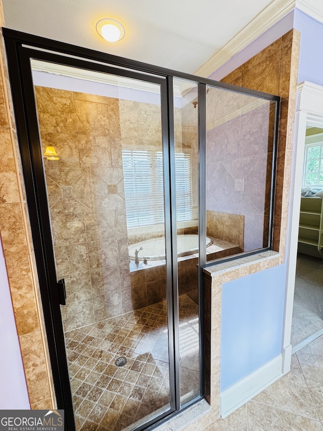 1023 Little Darby Ln, Suwanee, GA 30024 - bathroom featuring a stall shower, tile patterned flooring, a bath, and crown molding
