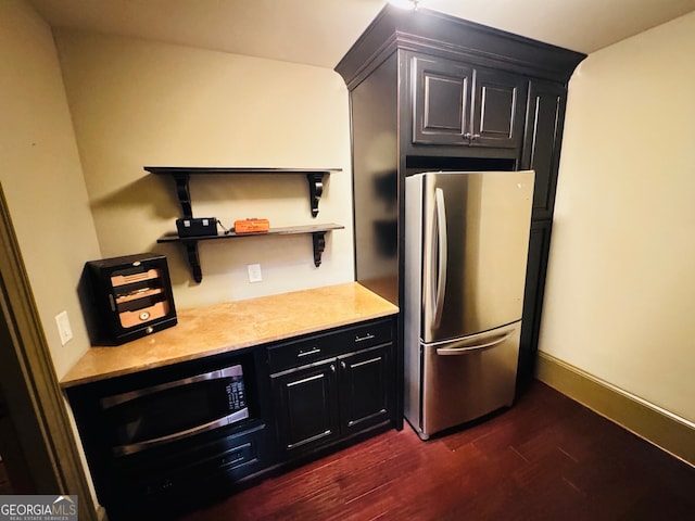 1023 Little Darby Ln, Suwanee, GA 30024 - kitchen featuring stainless steel appliances, dark wood-type flooring, light countertops, open shelves, and dark cabinets