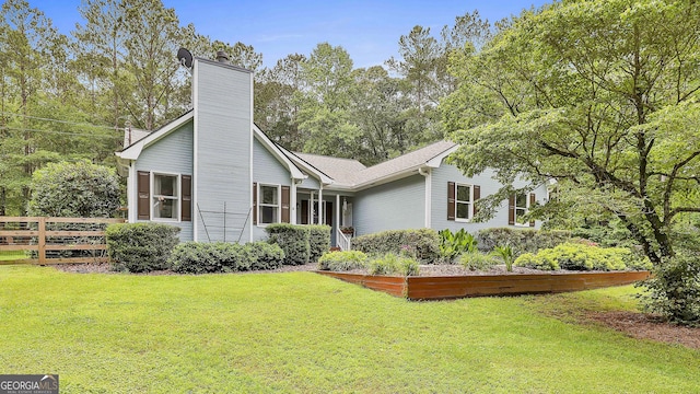 55 Hubbard Ct, Newnan, GA 30263 - view of front facade featuring a chimney