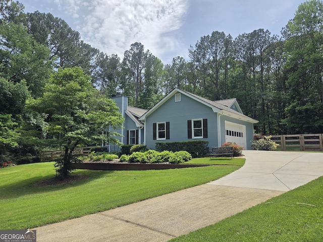55 Hubbard Ct, Newnan, GA 30263 - ranch-style house with concrete driveway, a garage, and a chimney