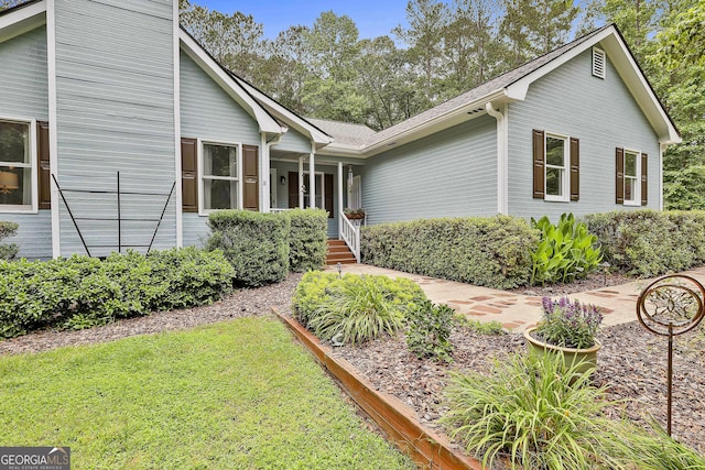 55 Hubbard Ct, Newnan, GA 30263 - ranch-style home featuring a front lawn and roof with shingles