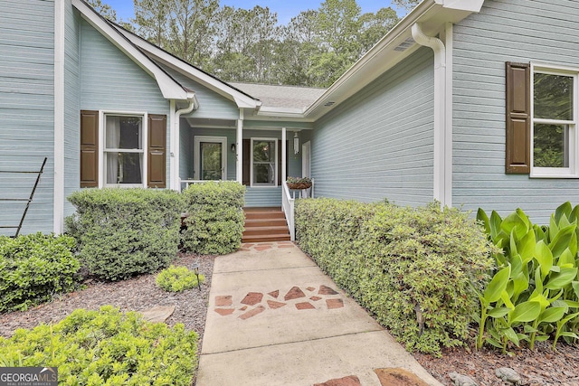 55 Hubbard Ct, Newnan, GA 30263 - view of exterior entry featuring a porch