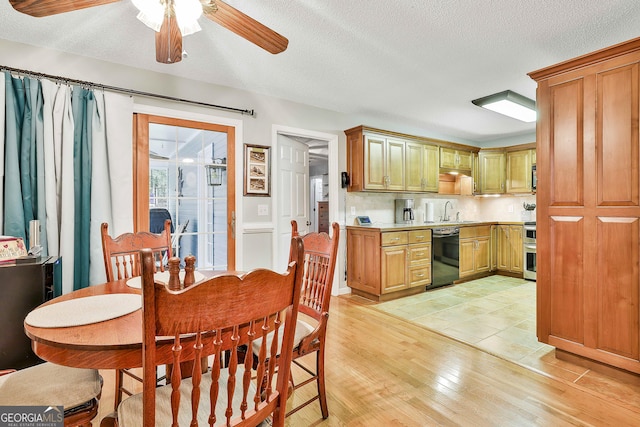 55 Hubbard Ct, Newnan, GA 30263 - dining space featuring ceiling fan, light wood-style flooring, and a textured ceiling