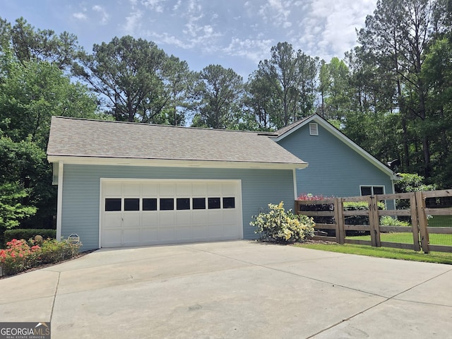 55 Hubbard Ct, Newnan, GA 30263 - view of side of property featuring driveway and an attached garage