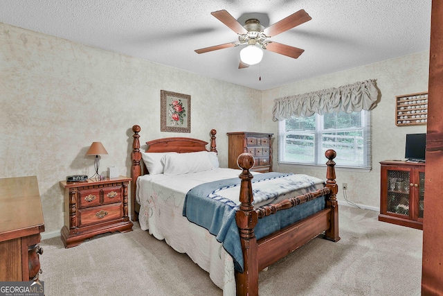 55 Hubbard Ct, Newnan, GA 30263 - bedroom with carpet floors, baseboards, a ceiling fan, and a textured ceiling