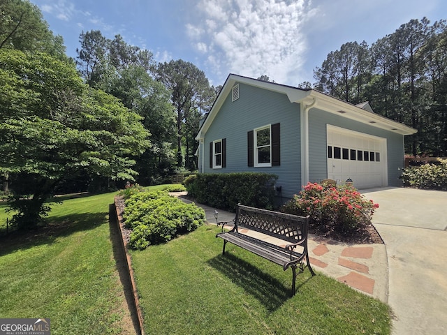 55 Hubbard Ct, Newnan, GA 30263 - view of front of property with driveway, a garage, and a front lawn