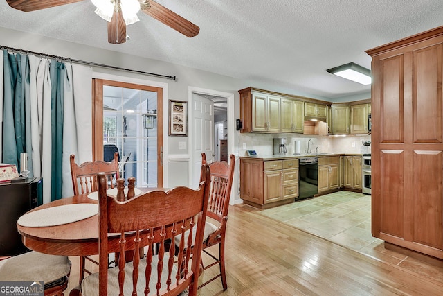 55 Hubbard Ct, Newnan, GA 30263 - dining area with a ceiling fan, light wood-style flooring, and a textured ceiling