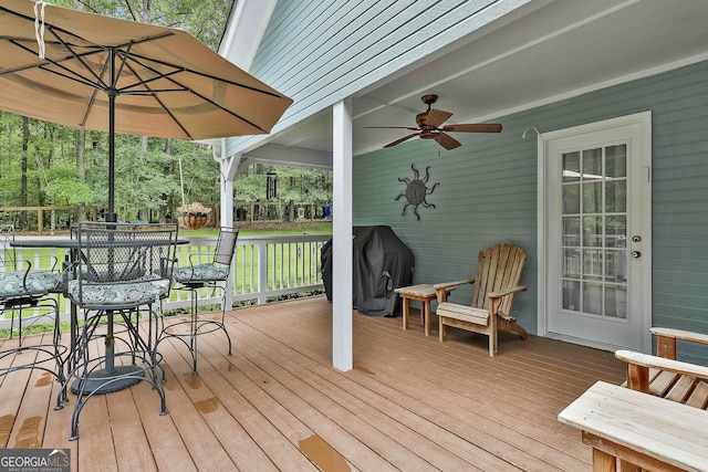 55 Hubbard Ct, Newnan, GA 30263 - deck with a grill and a ceiling fan