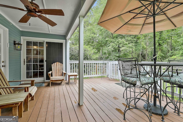 55 Hubbard Ct, Newnan, GA 30263 - deck with ceiling fan and view of scattered trees