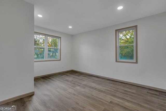 1601 Coventry St, Savannah, GA 31415 - spare room with healthy amount of natural light, wood finished floors, recessed lighting, and baseboards
