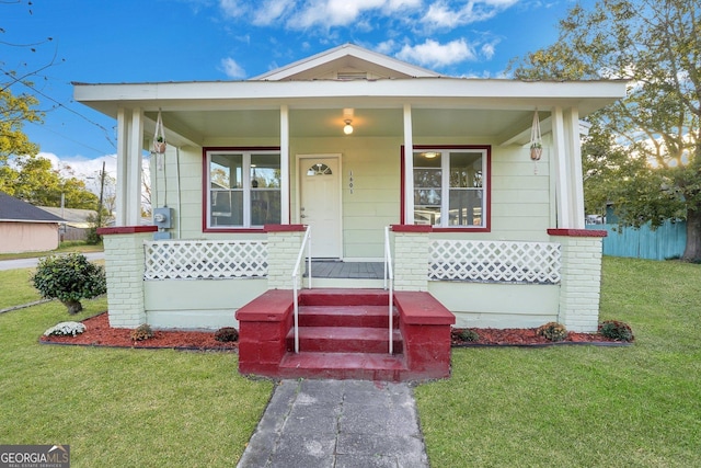 1601 Coventry St, Savannah, GA 31415 - view of front of home featuring a porch and a front yard