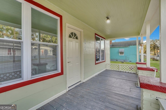 1601 Coventry St, Savannah, GA 31415 - wooden deck featuring covered porch