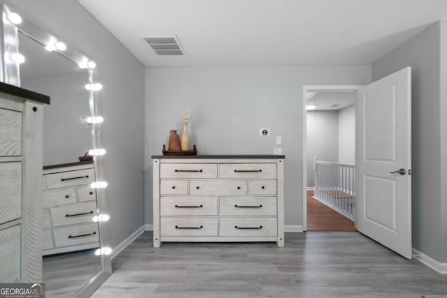 1630 Marsanne Ter NW Unit 27, Kennesaw, GA 30152 - bedroom with light wood finished floors and baseboards