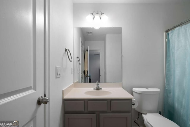 1630 Marsanne Ter NW Unit 27, Kennesaw, GA 30152 - bathroom featuring vanity, toilet, and a shower with shower curtain