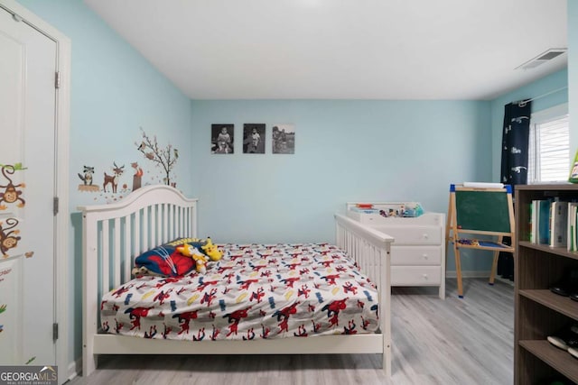 1630 Marsanne Ter NW Unit 27, Kennesaw, GA 30152 - bedroom with wood finished floors