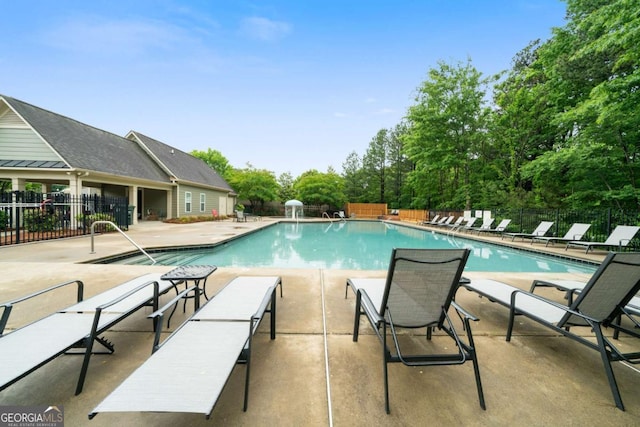 1630 Marsanne Ter NW Unit 27, Kennesaw, GA 30152 - community pool with fence and a patio