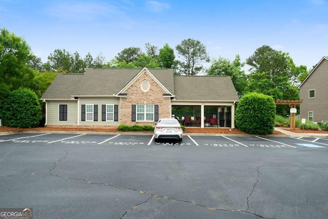 1630 Marsanne Ter NW Unit 27, Kennesaw, GA 30152 - view of building exterior with uncovered parking
