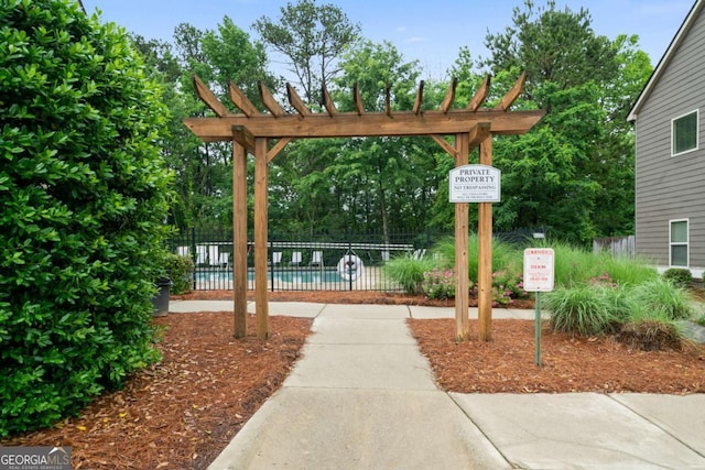1630 Marsanne Ter NW Unit 27, Kennesaw, GA 30152 - view of community with a swimming pool and fence