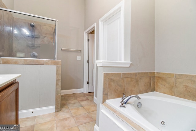 2551 Village Creek Lndg SE, Atlanta, GA 30316 - full bath featuring walk in shower, a tub with jets, vanity, and tile patterned flooring
