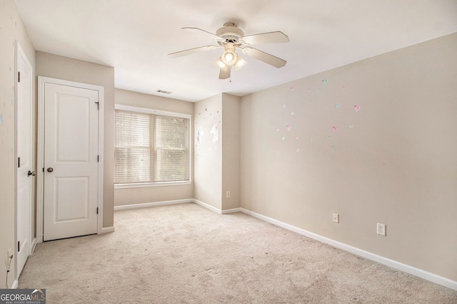 2551 Village Creek Lndg SE, Atlanta, GA 30316 - unfurnished bedroom featuring carpet floors, baseboards, and ceiling fan