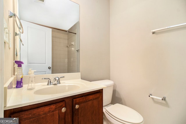 2551 Village Creek Lndg SE, Atlanta, GA 30316 - full bathroom with toilet, vanity, and a shower