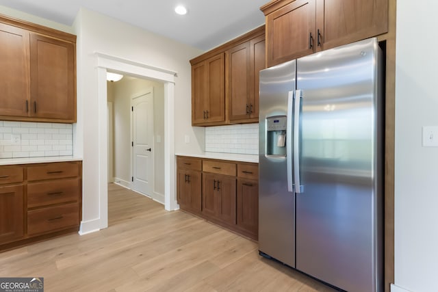 113 Summit View Ln, Ellijay, GA 30540 - kitchen featuring stainless steel fridge with ice dispenser, backsplash, light countertops, and recessed lighting